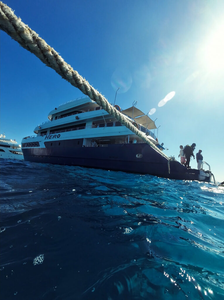 A picture of a boat called Hero where we live during our Egypt liveaboard, from the water